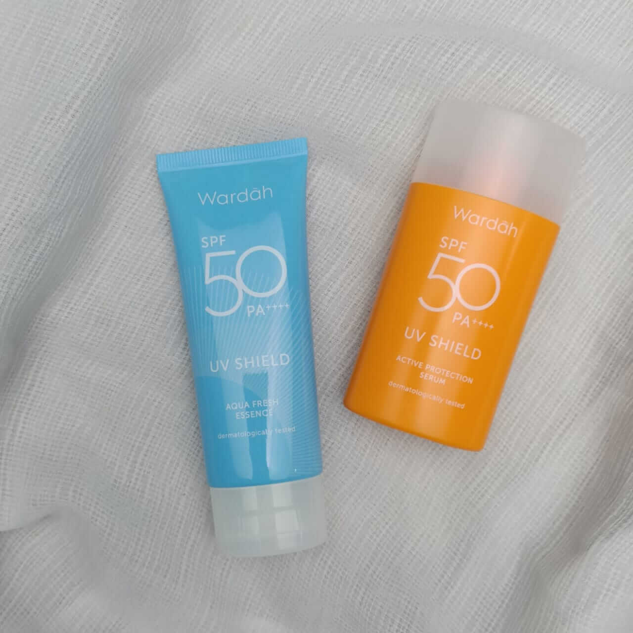 Perbedaan Sunscreen Wardah SPF 50 Biru dan Orange